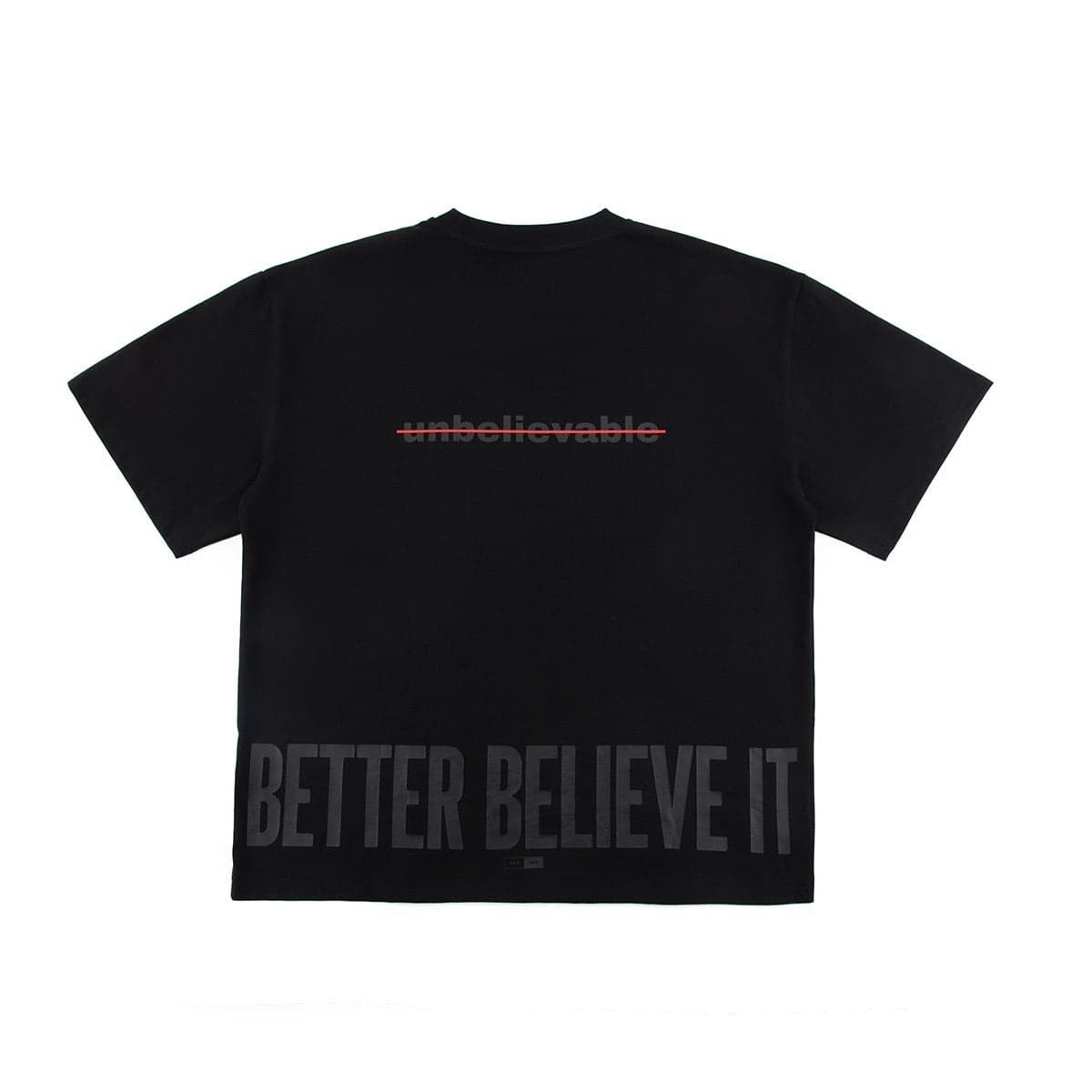 Back of the black Better Believe It tee: “unbelievable” struck through in red, BETTER BELIEVE IT across the hem