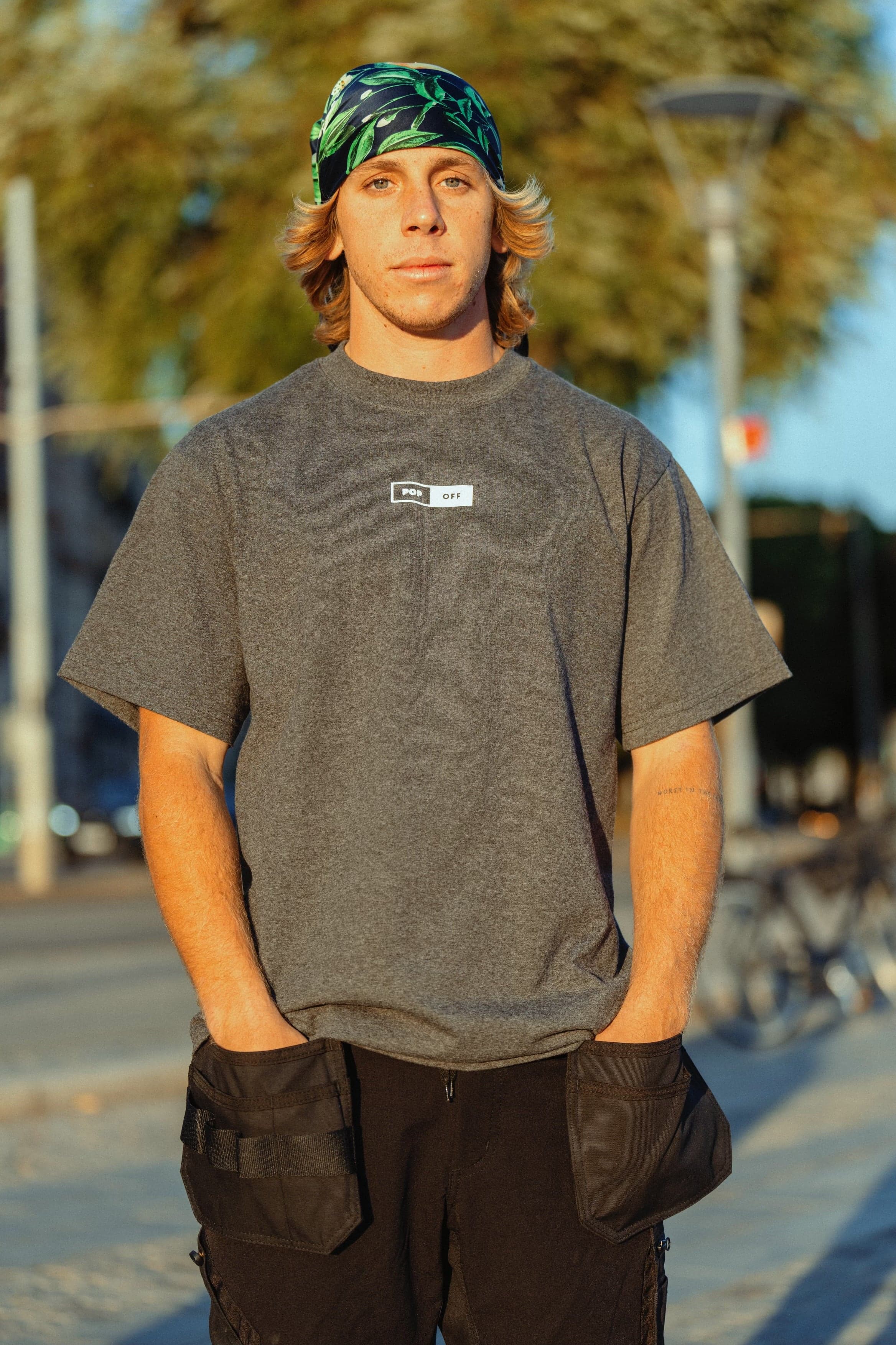 Reagan Popoff in the grey tee, front view, small Popoff logo on the chest